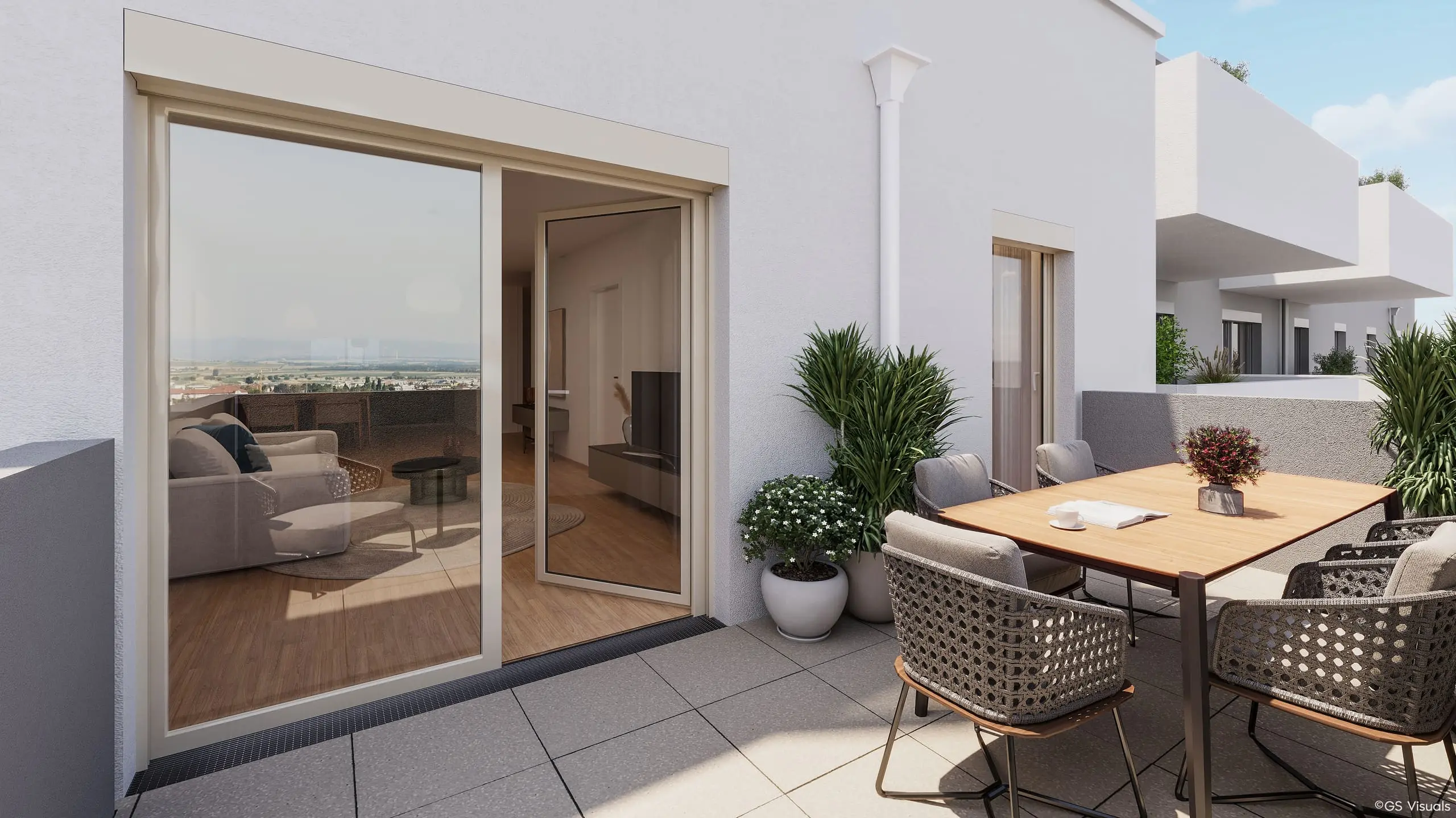 Terrasse mit Essplatz und Topfpflanzen, Blick über die Stadt